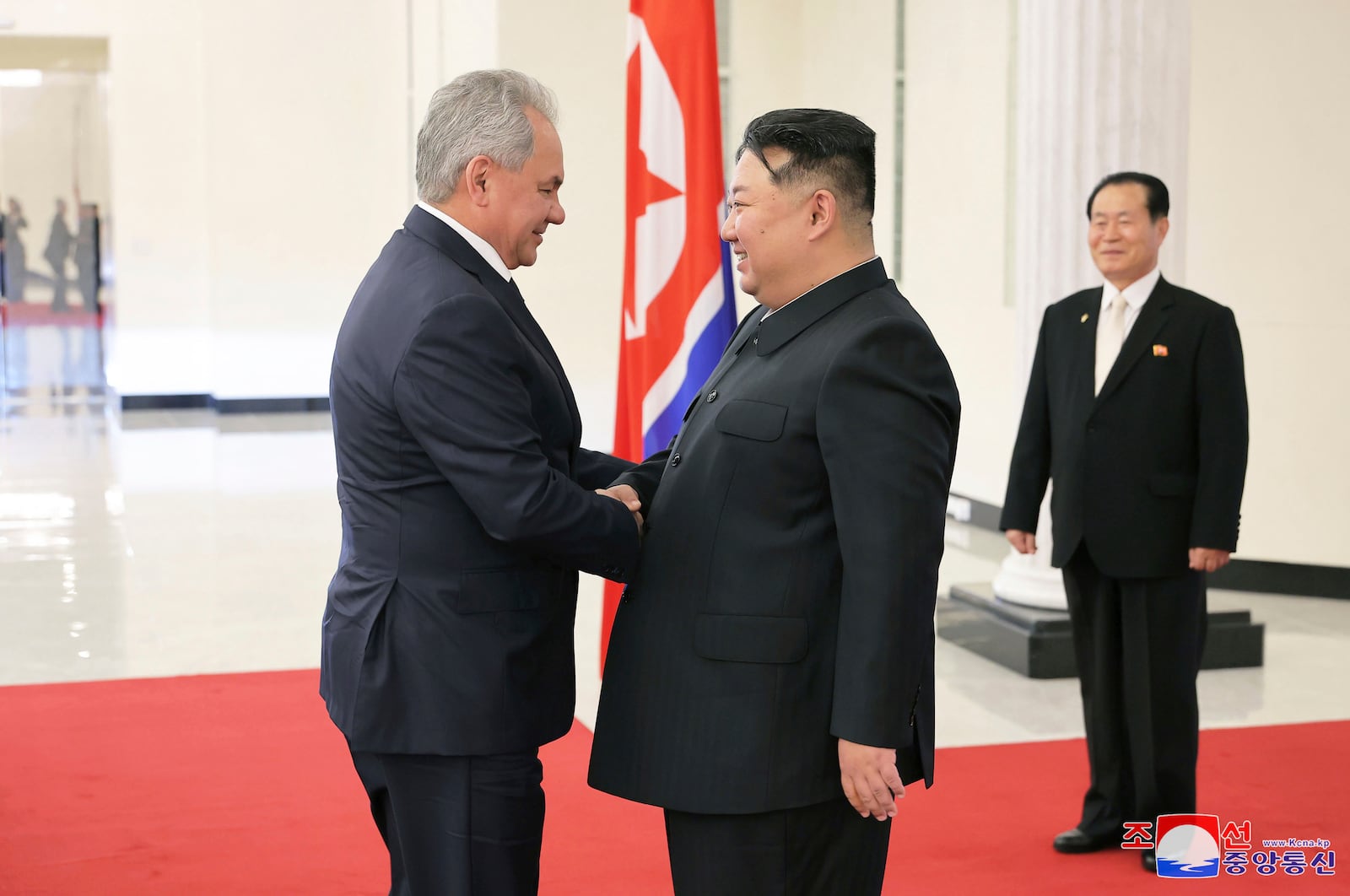 In this this photo provided by the North Korean government, Russia's Security Council Secretary, Sergey Shoigu, left, and North Korean leader Kim Jong Un shake hands during their meeting in Pyongyang, North Korea Friday, March 21, 2025. Independent journalists were not given access to cover the event depicted in this image distributed by the North Korean government. The content of this image is as provided and cannot be independently verified. Korean language watermark on image as provided by source reads: "KCNA" which is the abbreviation for Korean Central News Agency. (Korean Central News Agency/Korea News Service via AP)