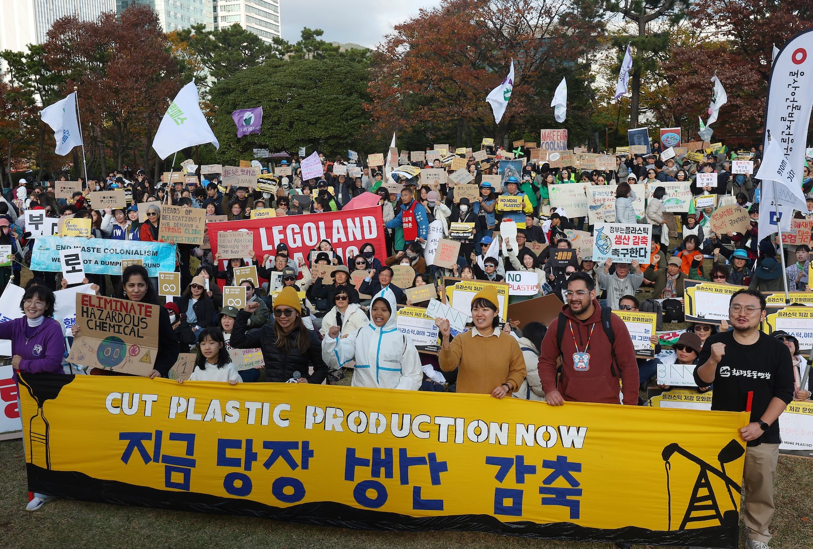 Environment activists stage a rally calling for a strong global plastics treaty ahead of the fifth session of the Intergovernmental Negotiating Committee on Plastic Pollution which sets to be held from Nov. 25 to Dec. 1 in Busan, South Korea, Saturday, Nov. 23, 2024. (Son Hyung-joo/Yonhap via AP)