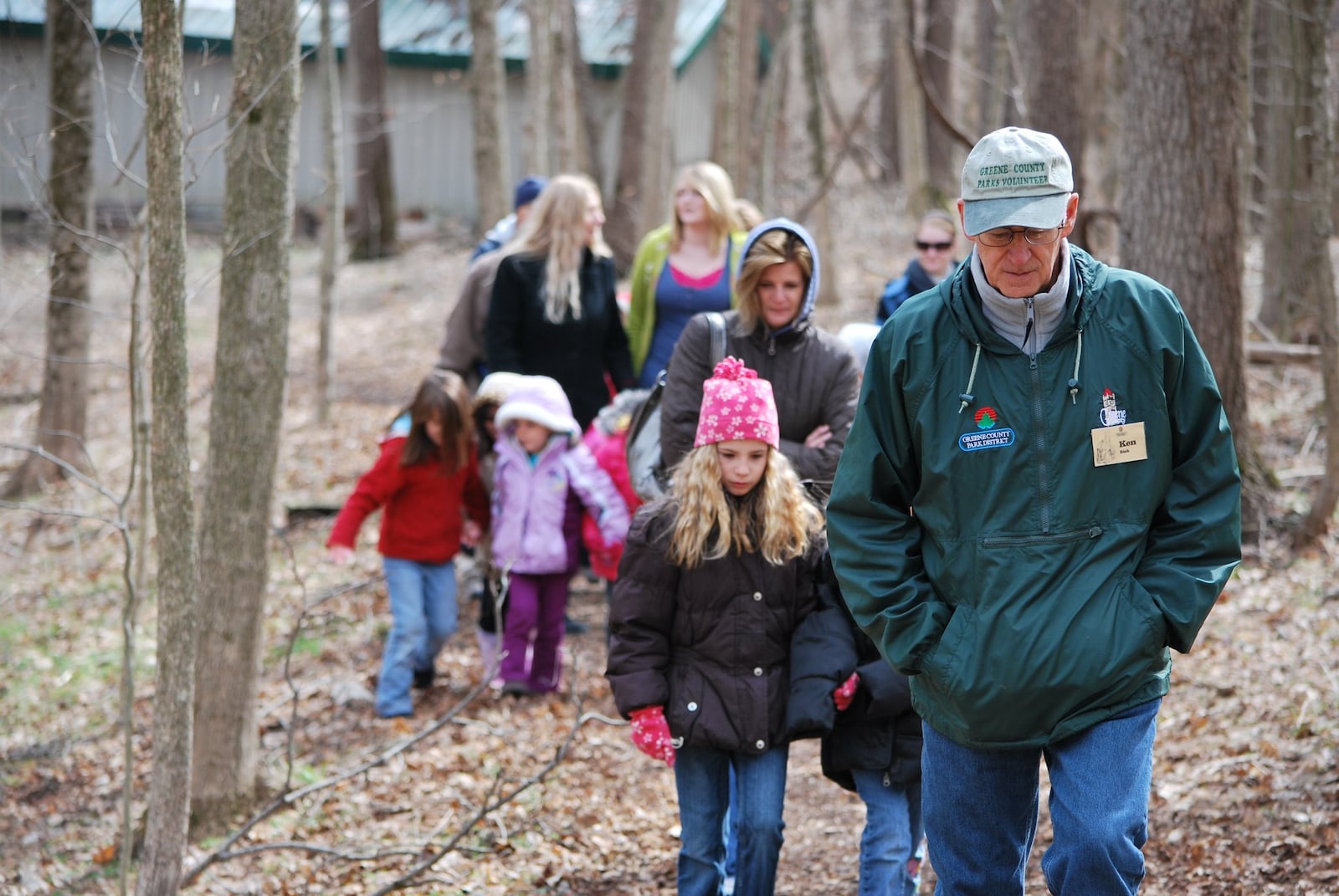 Beavercreek resident and Greene County Parks & Trails volunteer Ken Bish leads a group of hikers at the Narrows Reserve, Beavercreek. Contributed photo by Greene County Parks and Trails.