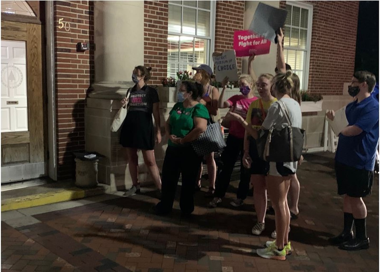 Pro-choice supporters continue their demonstration after the Lebanon City Council meeting was adjourned late Tuesday night. ED RICHTER/STAFF