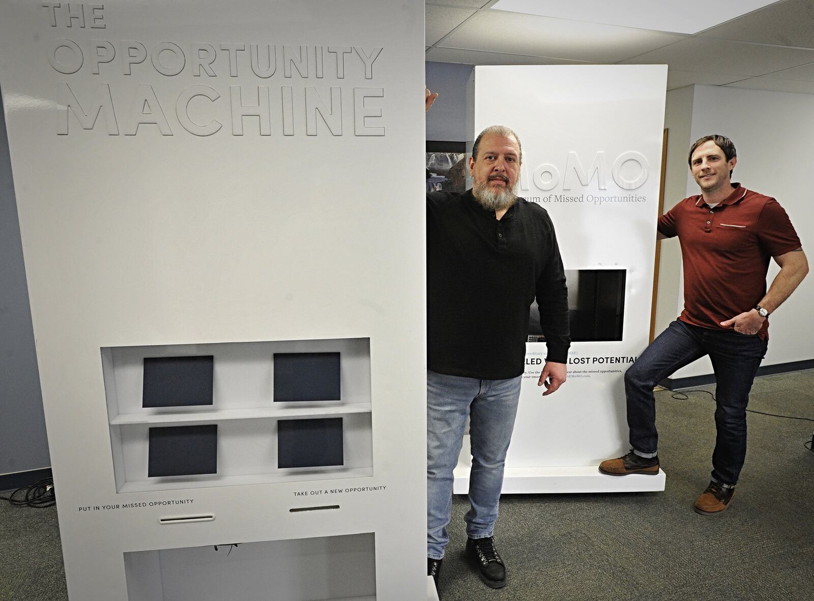 Innovative Vending Solutions, President, Patrick McDonald, left and Vice President Jeff Thibodeau stand with two of their companies newest vending machines. Staff Photo Marshall Gorby