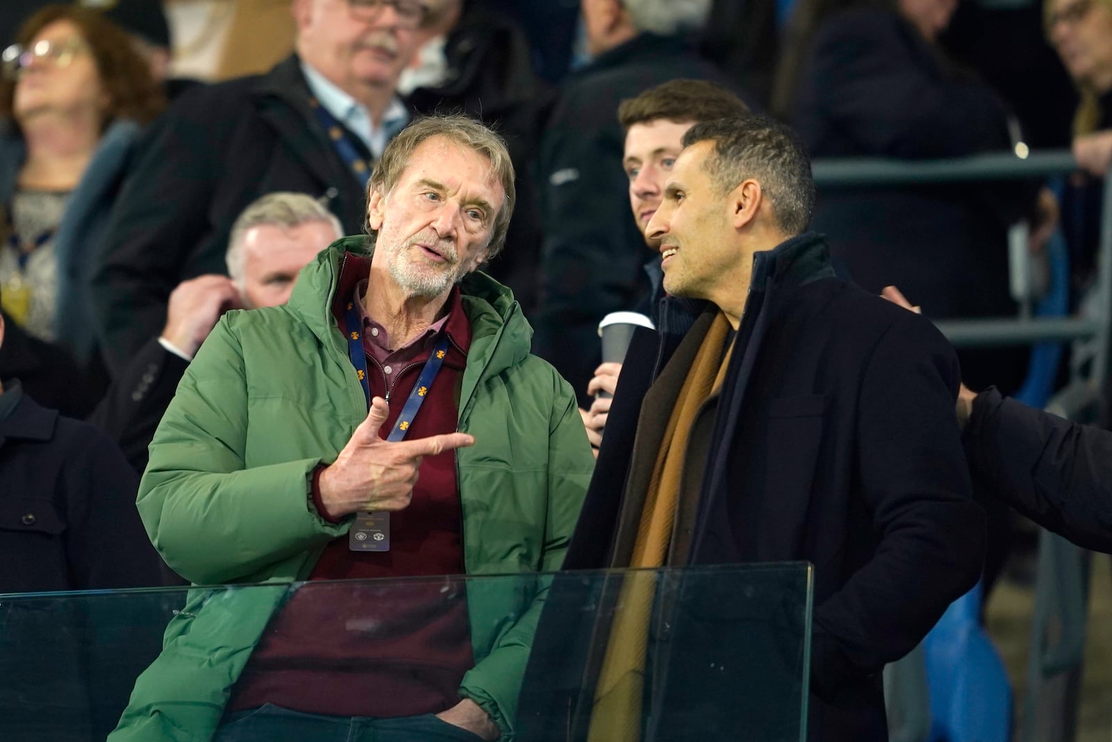 Manchester United owner Sir Jim Ratcliffe, left, talks with Manchester City chairman Khaldoon Al Mubarak ahead the English Premier League soccer match between Manchester City and Manchester United at the Etihad Stadium in Manchester, Sunday, Dec. 15, 2024. (AP Photo/Dave Thompson)