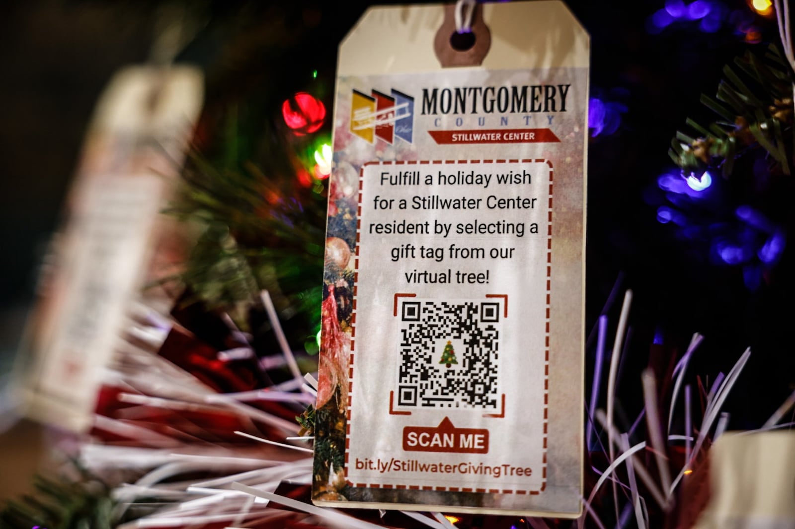 The holiday giving tree in the Montgomery County Administration Building on West Third Street is up. This tree has tag ornaments that contain the info of people living at Stillwater Center, which is a care facility for people with disabilities or long-term illness. JIM NOELKER/STAFF