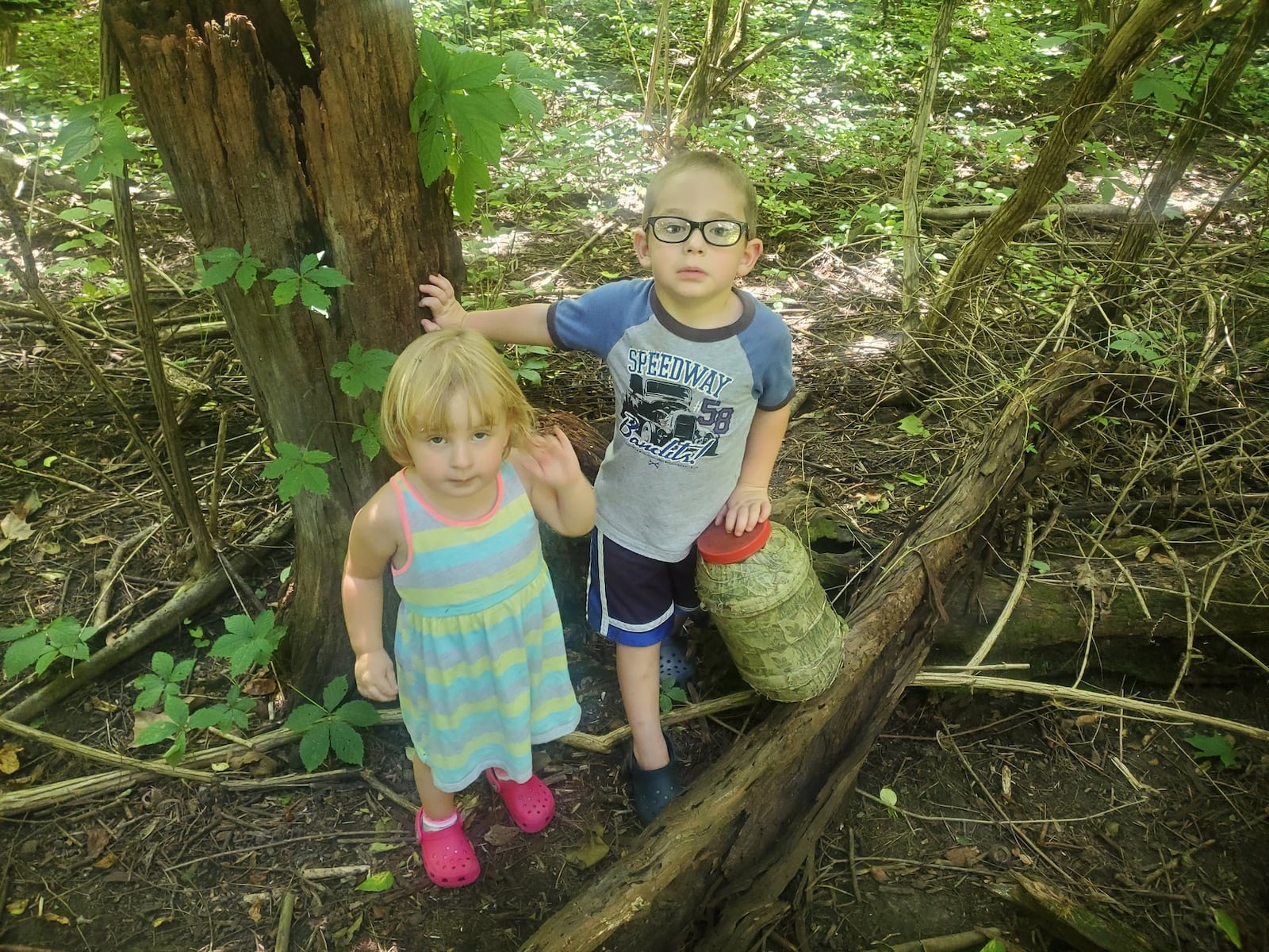 Rebecca Boyd of the Miami Valley Geocachers participated in an outing with her grandchildren, Daisy and Dominic, with a cache at a Columbus MetroPark last summer. REBECCA BOYD / MIAMI VALLEY GEOCACHERS