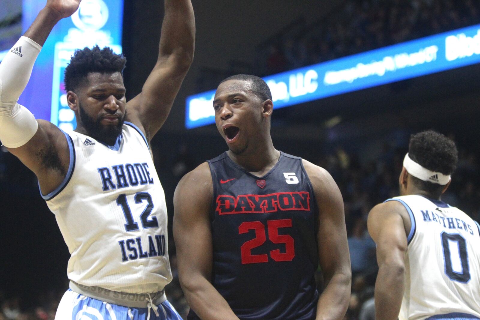 Kendall Pollard celebrates a basket against Rhode Island’s Hassan Martin with just over two minutes to play Friday in Kingston, R.I. David Jablonski/Staff