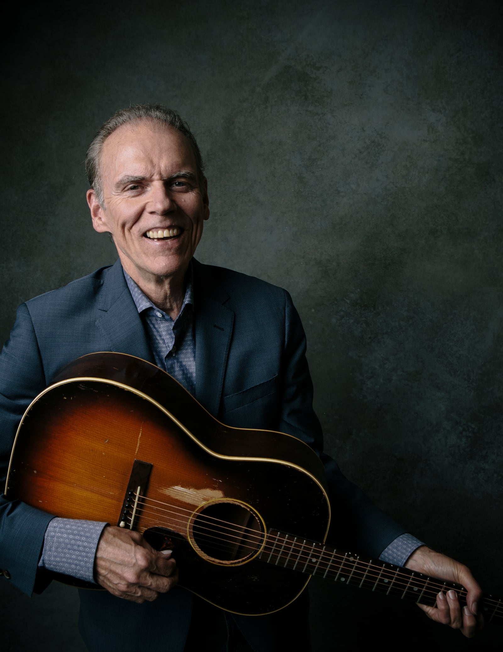 John Hiatt, who increased the number of shows in 2022 from his recent average of about 50 dates to more than 80 to celebrate his 70th birthday in August, performs with Buddy Guy at Rose Music Center in Huber Heights on Sunday, July 31.