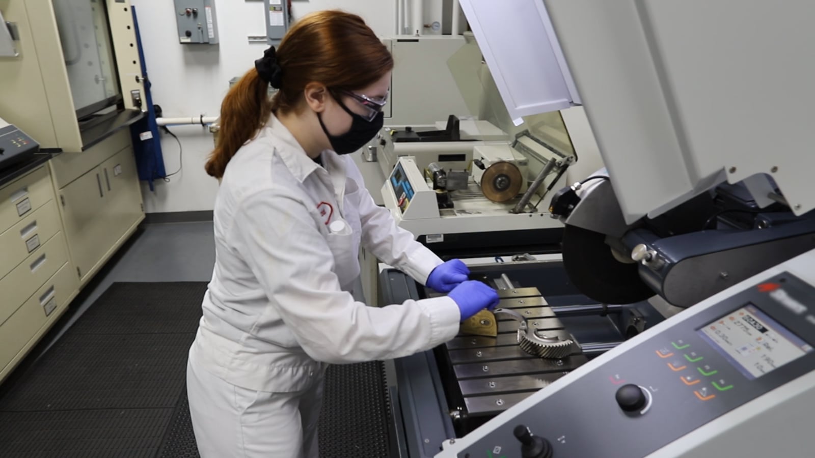 Honda employee Rachel Lavrich cuts a gear in a cut-off saw during a Manufacturing Day presentation at the Russells Point transmission plant in Ohio. Honda image