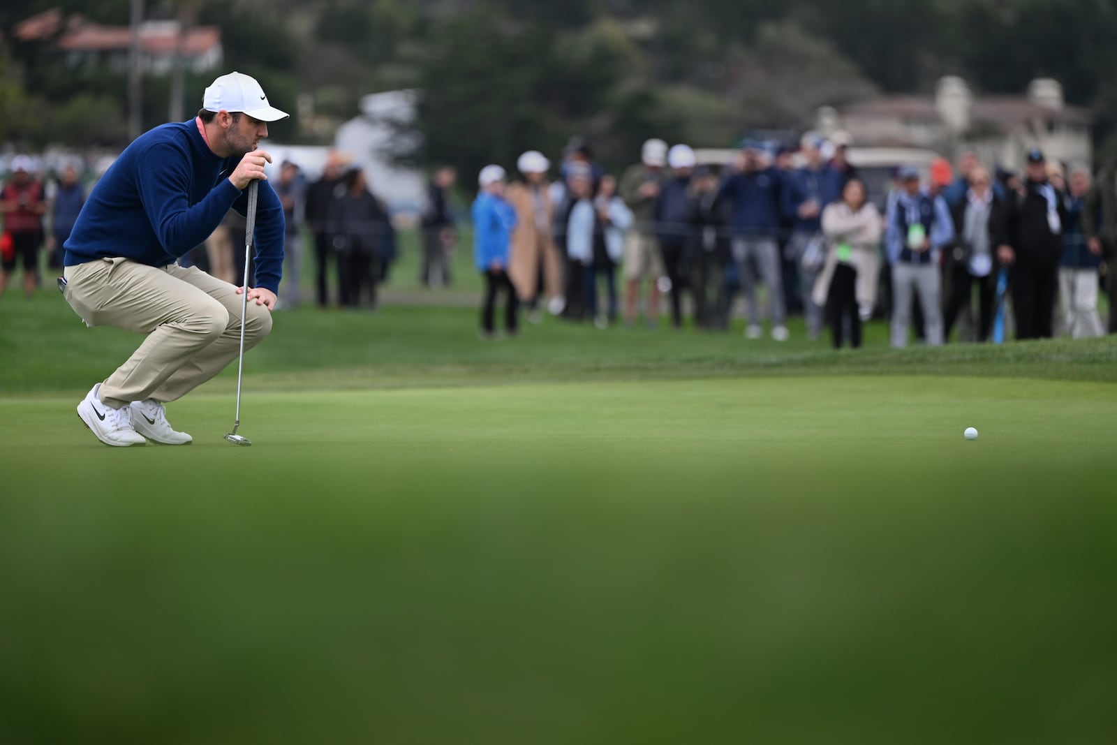 Scottie Scheffler lines up a putt on the sixth hole at Pebble Beach Golf Links during the second round of the AT&T Pebble Beach Pro-Am golf tournament, Friday, Jan. 31, 2025, in Pebble Beach, Calif. (AP Photo/Nic Coury)