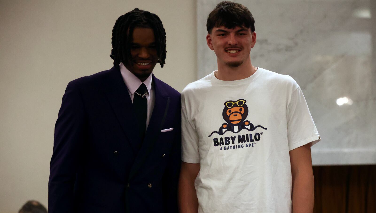 Hours before the NBA Draft, DaRon Holmes II poses for a photo former Dayton teammate Isaac Jack at the Lotte New York Palace on Wednesday, June 26, 2024, in New York City.