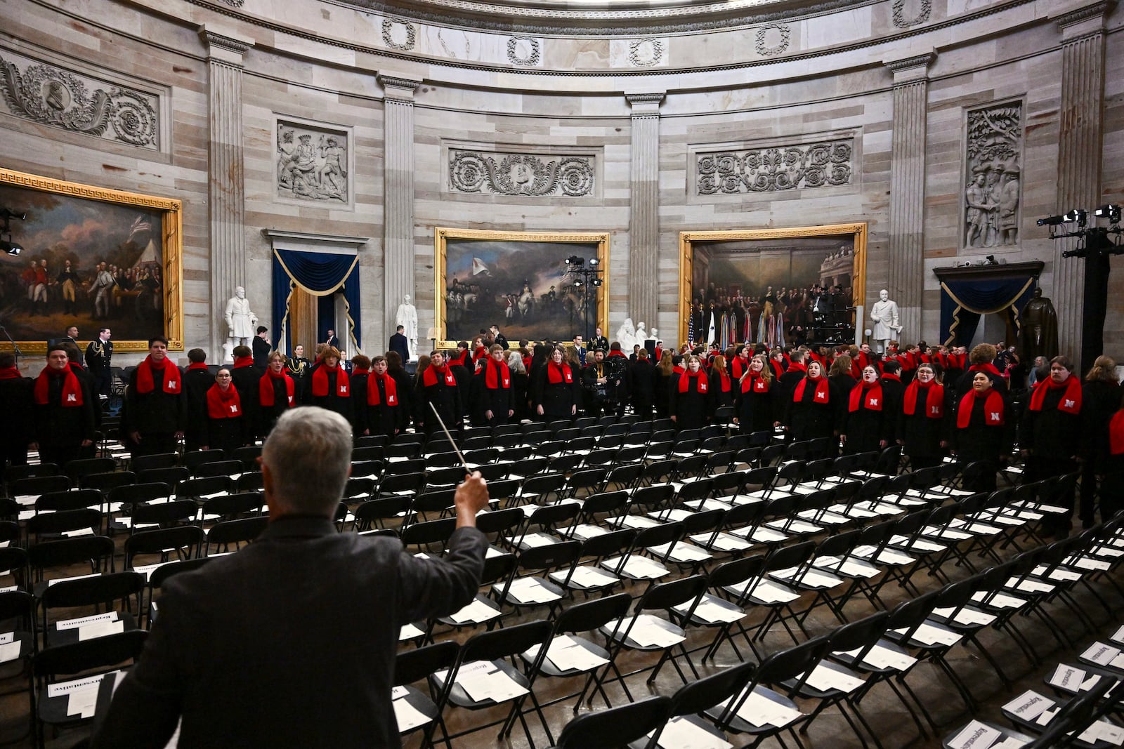 Choir students from the University of Nebraska-Lincoln practice before the 60th Presidential Inauguration in the Rotunda of the U.S. Capitol in Washington, Monday, Jan. 20, 2025. (Ricky Carioti/The Washington Post via AP, Pool)