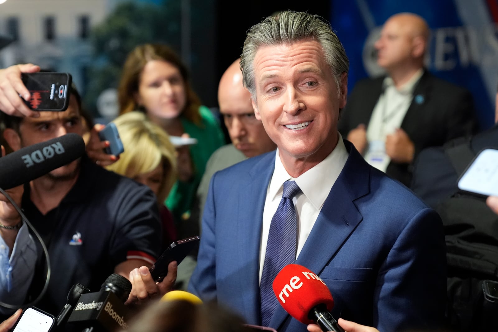 FILE - California Gov. Gavin Newsom speaks to reporters in the spin room before a presidential debate between Republican presidential nominee former President Donald Trump and Democratic presidential nominee Vice President Kamala Harris, Tuesday, Sept. 10, 2024, in Philadelphia. (AP Photo/Matt Rourke)