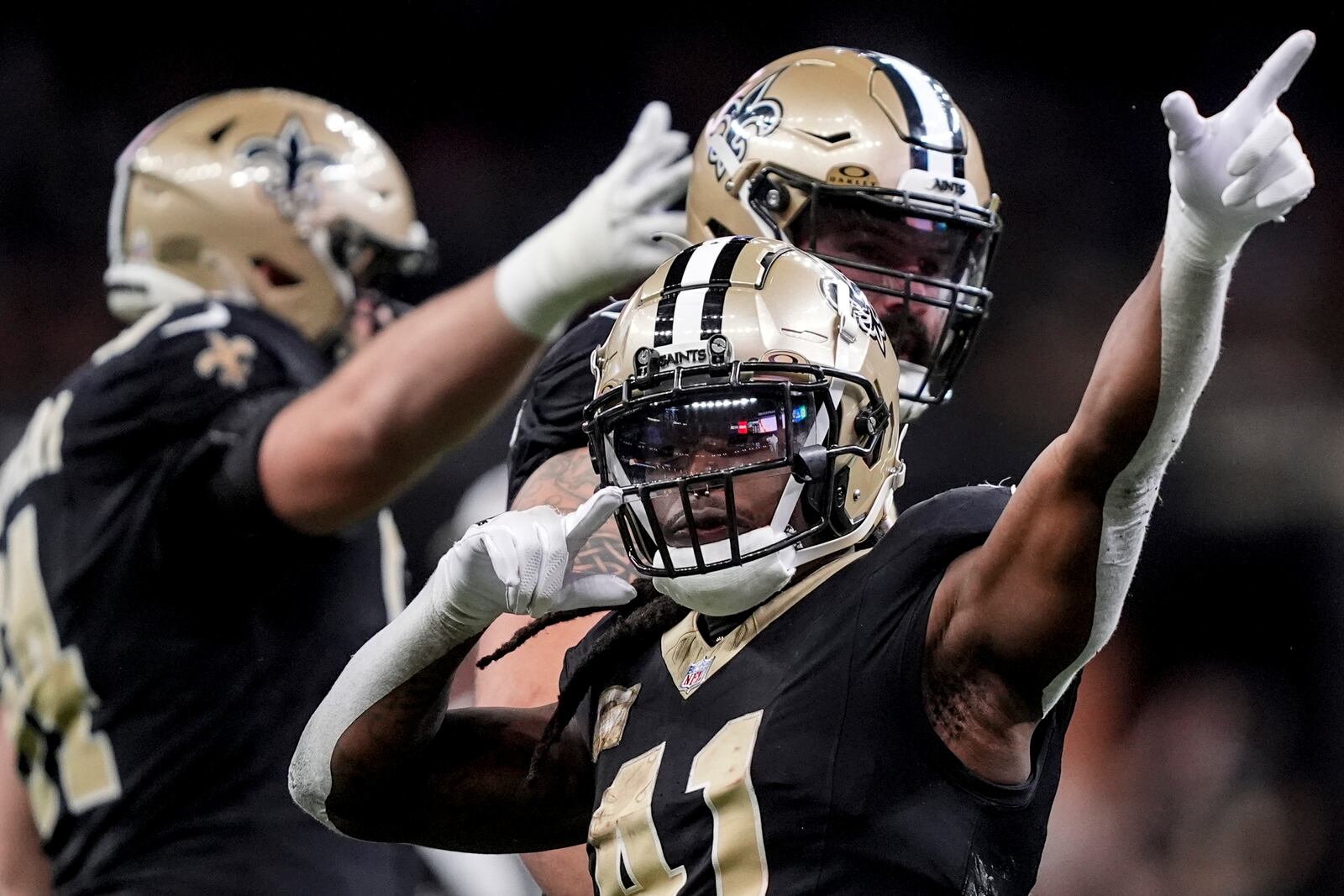 New Orleans Saints running back Alvin Kamara (41) celebrates a first down against the Atlanta Falcons during the second half of an NFL football game, Sunday, Nov. 10, 2024, in New Orleans. (AP Photo/Gerald Herbert)