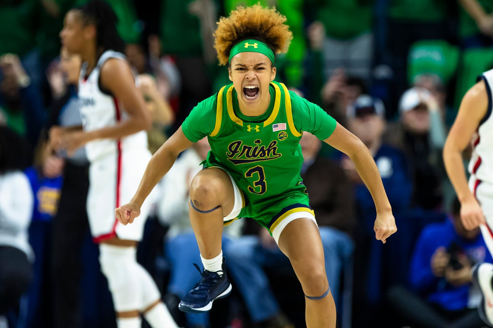 Notre Dame guard Hannah Hidalgo (3) celebrates during the first half of an NCAA college basketball game against UConn, Thursday, Dec. 12, 2024, in South Bend, Ind. (AP Photo/Michael Caterina)