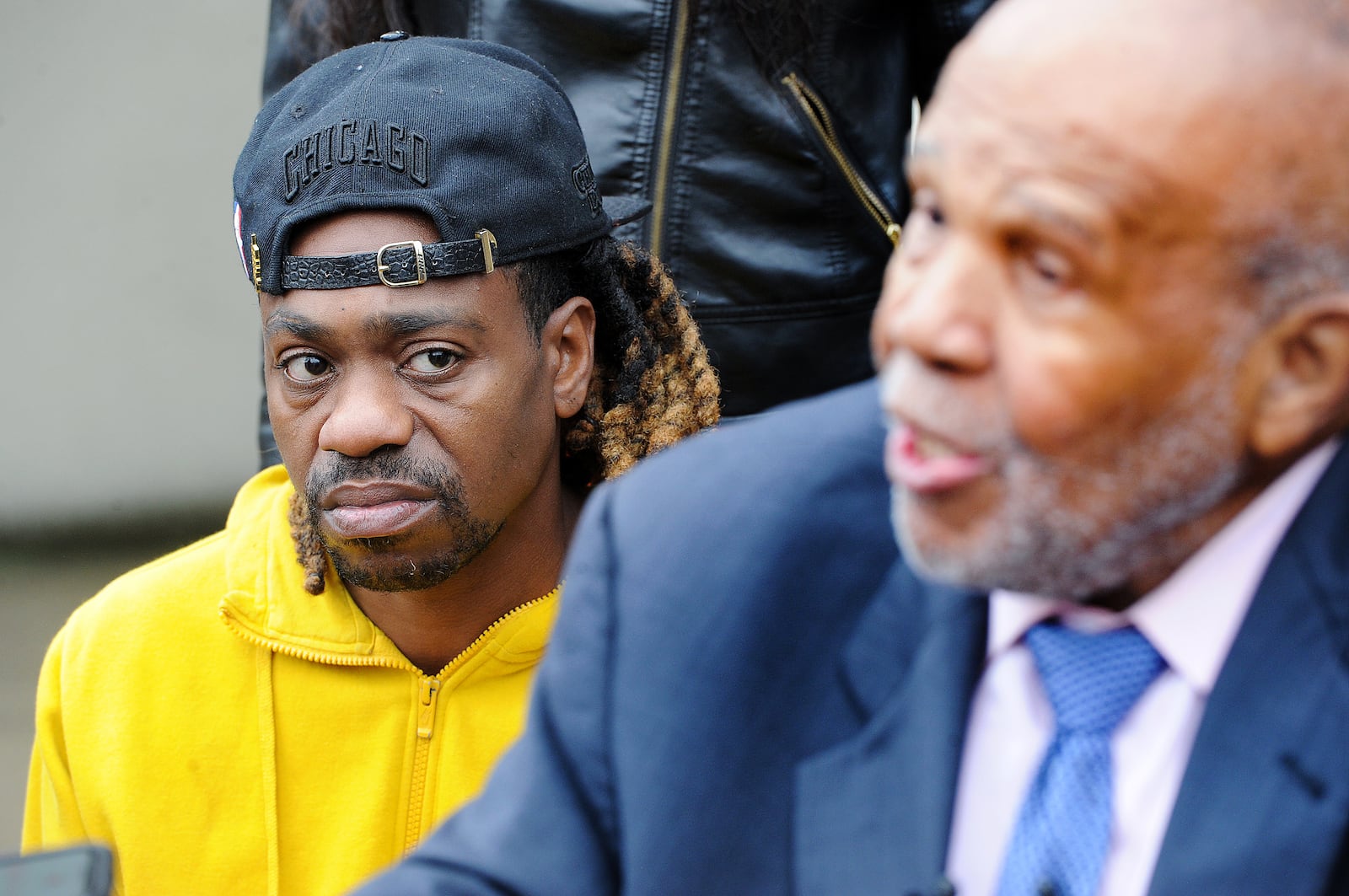 Clifford Owensby, left, listens to his attorney James Willis after court Monday, Oct. 25, 2021 about the minor traffic misdemeanors of September 30. Owensby was charged for a window tint and seat belt violation. He was found guilty of both traffic violations and fined $150 for each. MARSHALL GORBY\STAFF