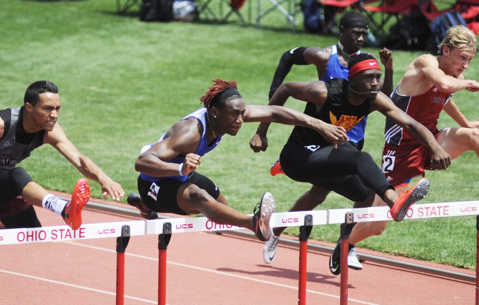 Dunbar senior Jalani Allen (second left) was second in the D-II high hurdles during the state track and field meet at OSU’s Jesse Owens Memorial Stadium in Columbus on Saturday, June 2, 2018. MARC PENDLETON / STAFF