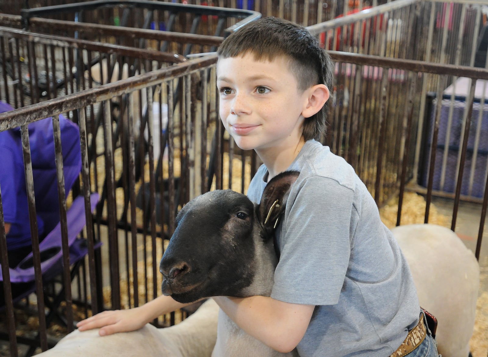 Clayton Ehlerding, of Jamestown, enjoyed his first year of showing his lambs, Bubby and Bella at the Greene County Fair. MARSHALL GORBY\STAFF