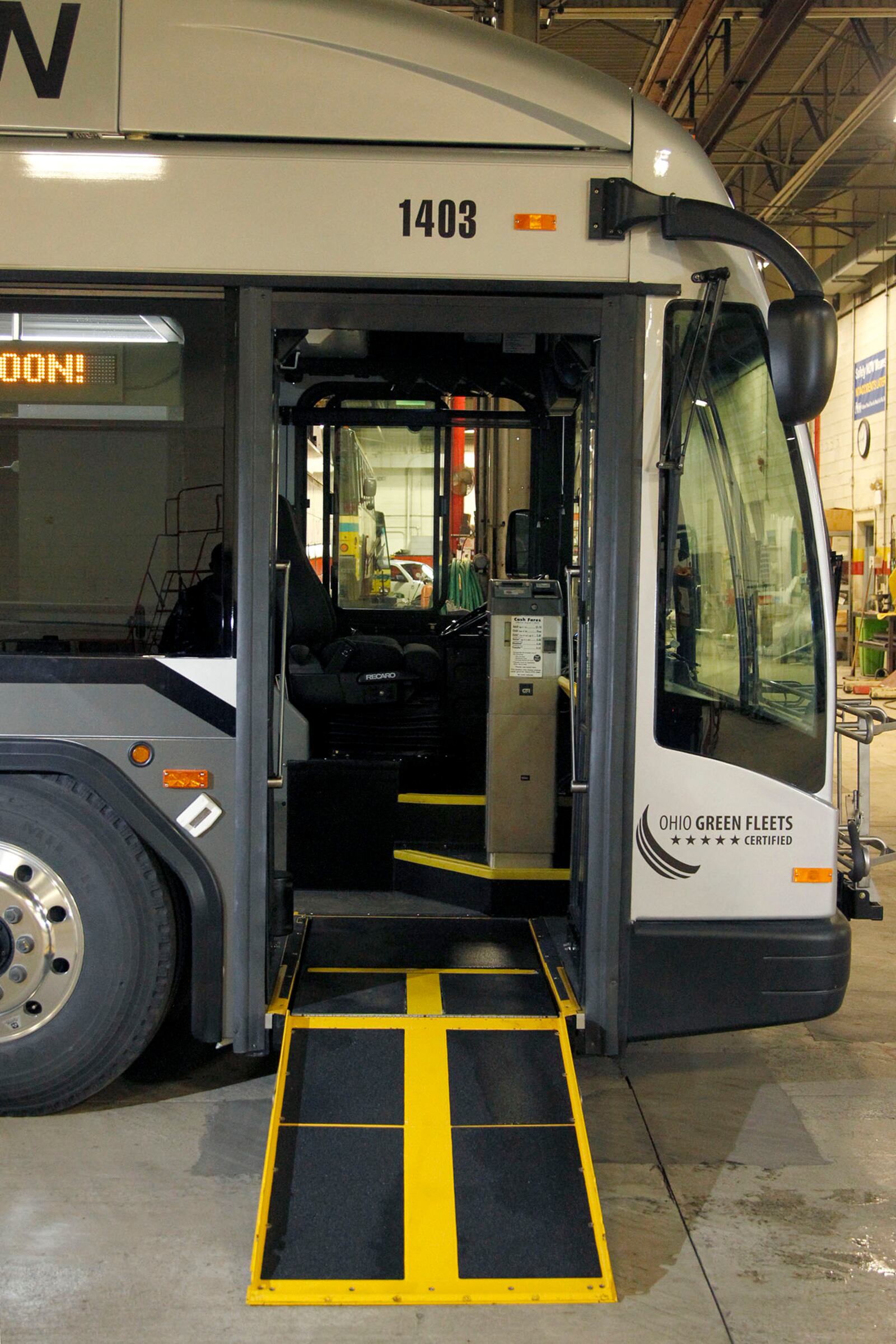 The NexGen electric trolley wheelchair ramp folds out.The bus kneels down, leaning closer to the ground,  and the ramp folds out, allowing the wheelchair to be rolled inside.   LISA POWELL / STAFF