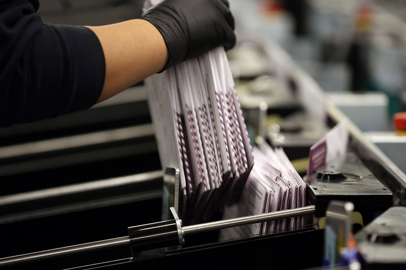 Ballots are scanned and sorted at San Francisco Department of Elections in City Hall in San Francisco on Wednesday, Nov. 6, 2024. (Scott Strazzante/San Francisco Chronicle via AP)