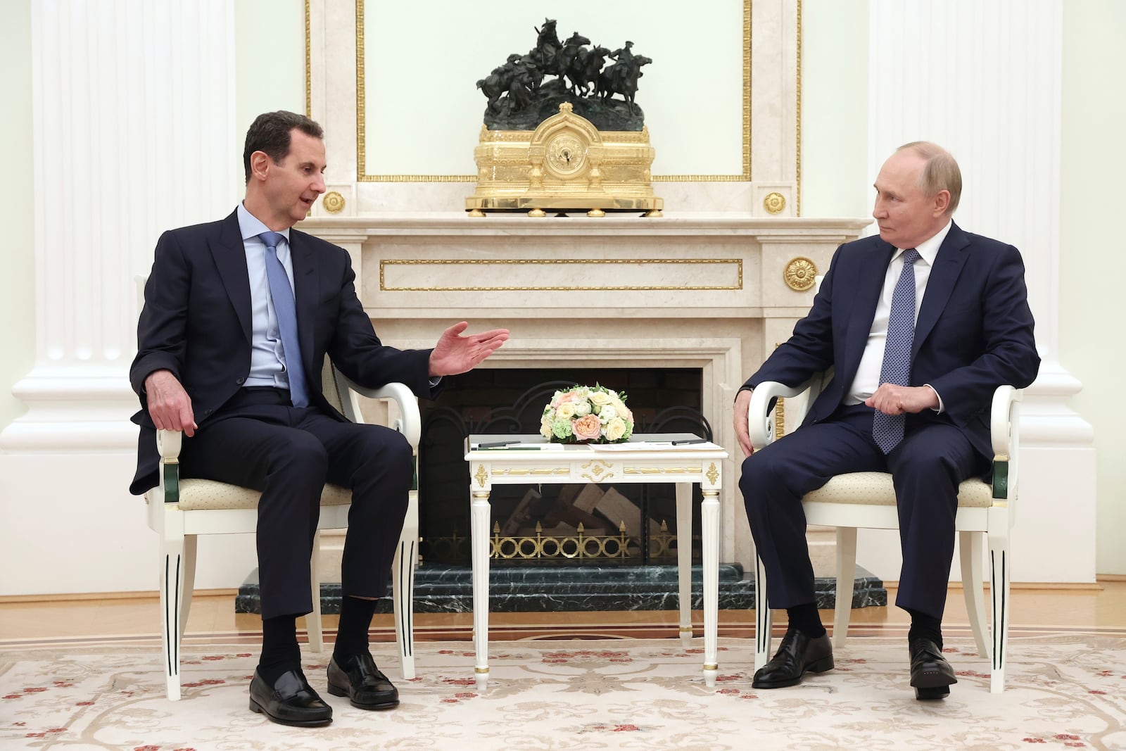 FILE - Syrian President Bashar Assad, left, speaks with Russian President Vladimir Putin during a meeting in Moscow, Russia, on July 24, 2024. (Valery Sharifulin, Sputnik, Kremlin Pool Photo via AP, File)