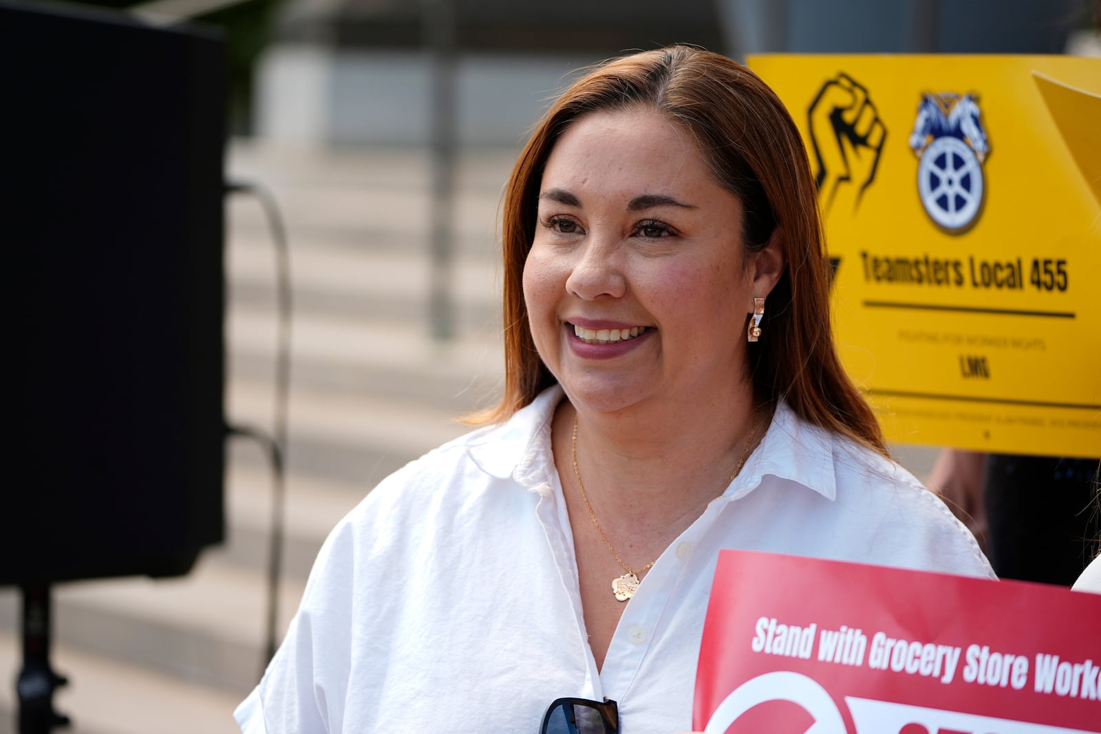 U.S. Rep. Yadira Caraveo, D-Colo., joins a protest by union members against the proposed merger of grocery store chains Kroger and Albertsons Monday, Sept. 30, 2024, outside the City/County Building while inside the courthouse the Colorado attorney's general office presented its case against the merger in the opening day of the trial in Denver. (AP Photo/David Zalubowski)