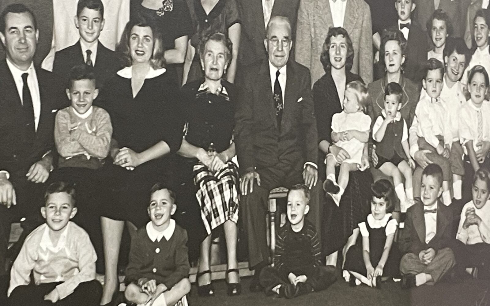 George Walther, Sr., started the Dayton Steel Foundry more than 100 years ago. He is seen here near the middle with a suit and tie surrounded by employees and family members in a photo taken in the 1950s. NICK BLIZZARD/STAFF