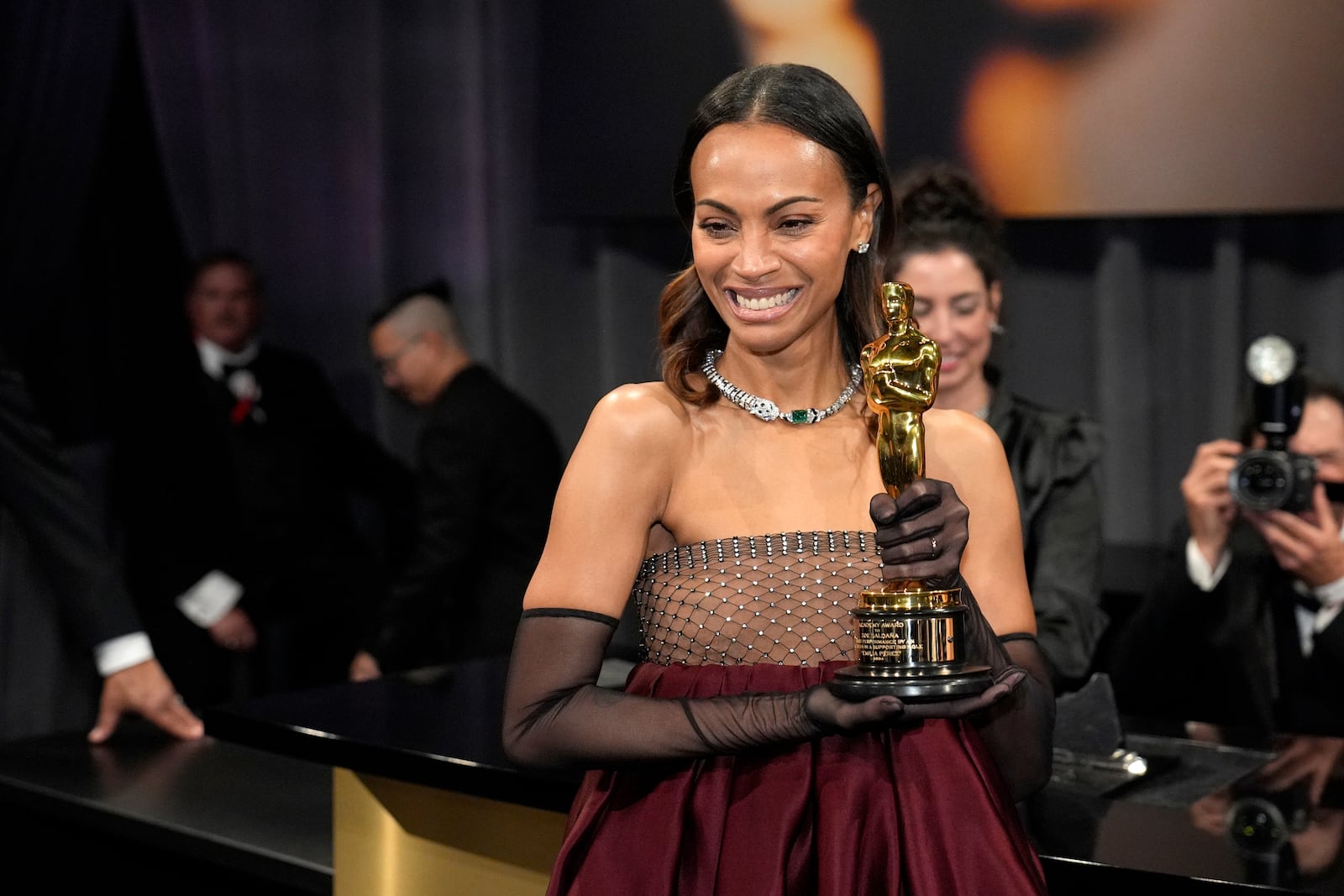 Zoe Saldana, winner of the award for best performance by an actress in a supporting role for "Emilia Perez," attends the Governors Ball after the Oscars on Sunday, March 2, 2025, in Los Angeles. (AP Photo/John Locher)