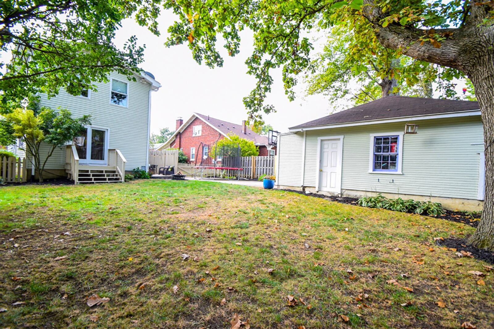 Patio doors off the family room open to the fenced back yard and the detached, 2-car garage. CONTRIBUTED PHOTO