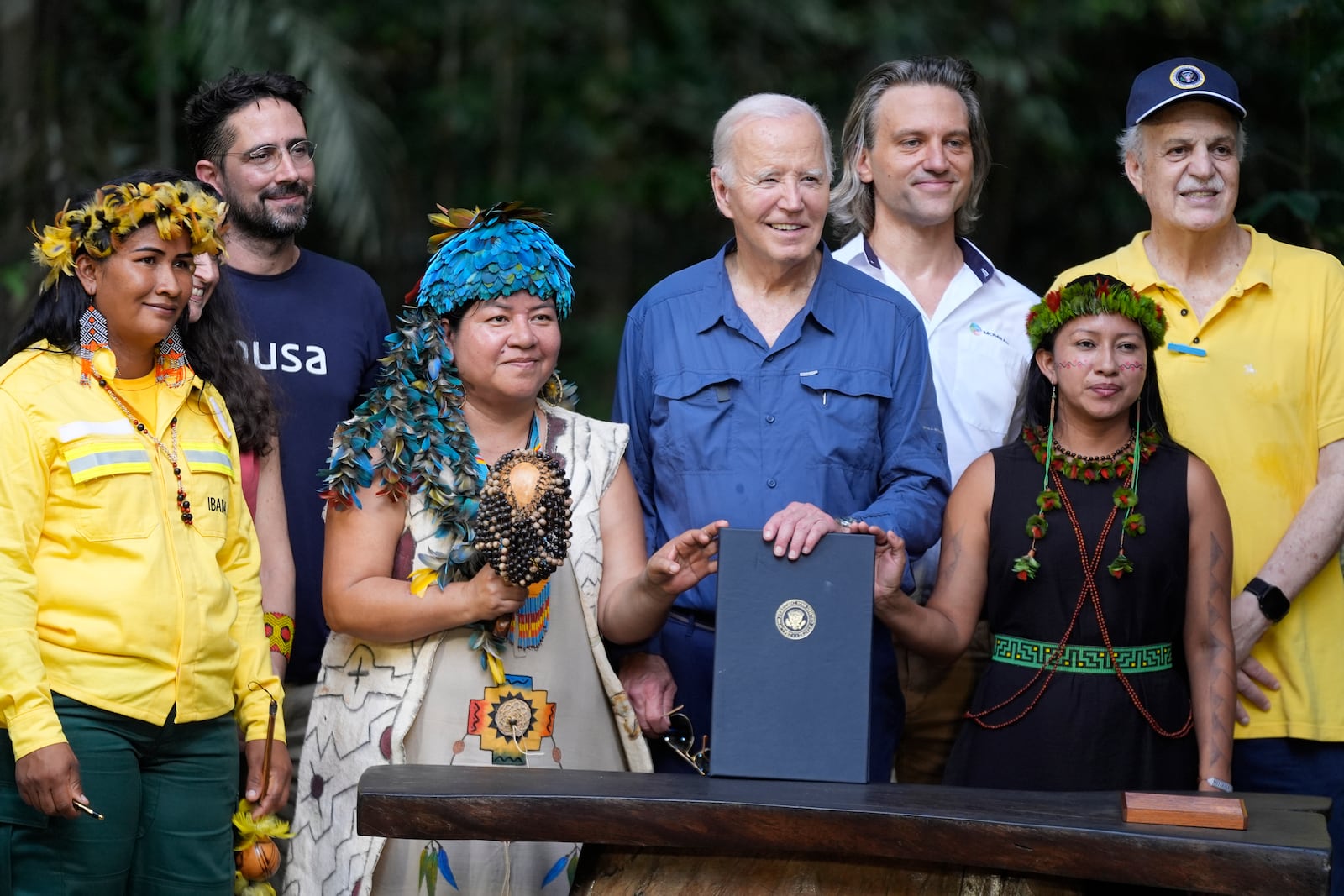 President Joe Biden poses after signing a proclamation designating Nov. 17 as International Conservation Day following a tour of the Museu da Amazonia, Sunday, Nov. 17, 2024, in Manaus, Brazil. (AP Photo/Manuel Balce Ceneta)