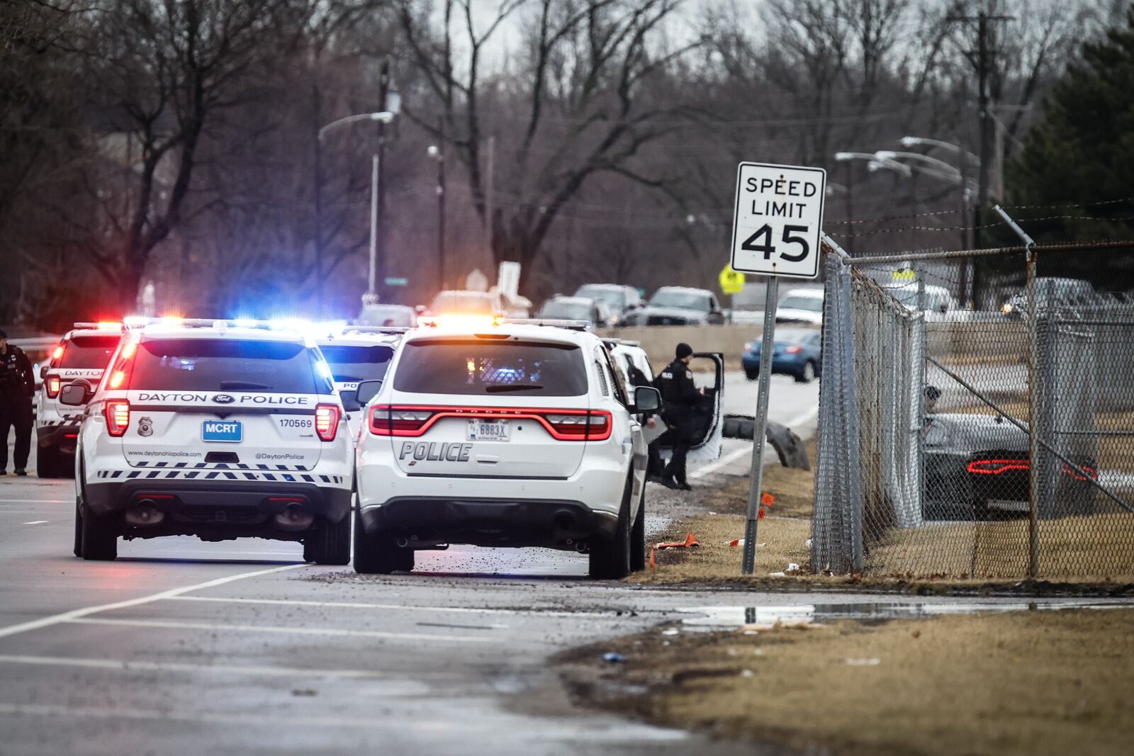 Police activity on Woodman Avenue near Airway Road | JIM NOELKER