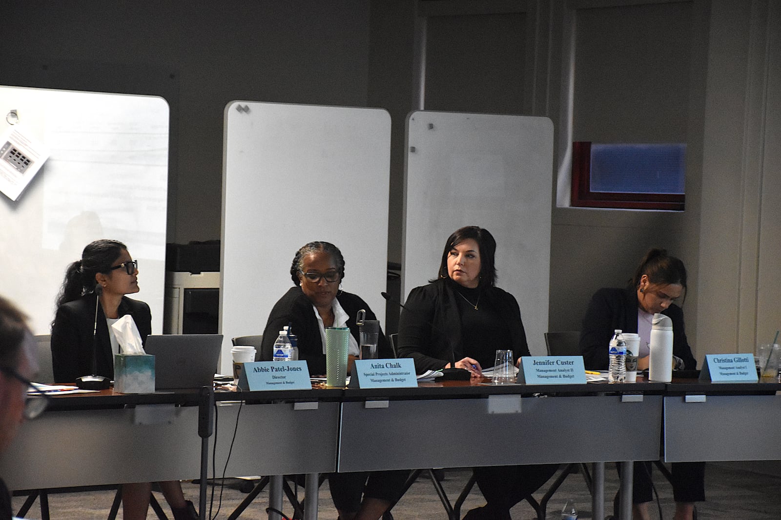 Abbie Patel-Jones, Dayton’s director of management and budget, and other members of her department during budget work sessions in October 2024. CORNELIUS FROLIK / STAFF