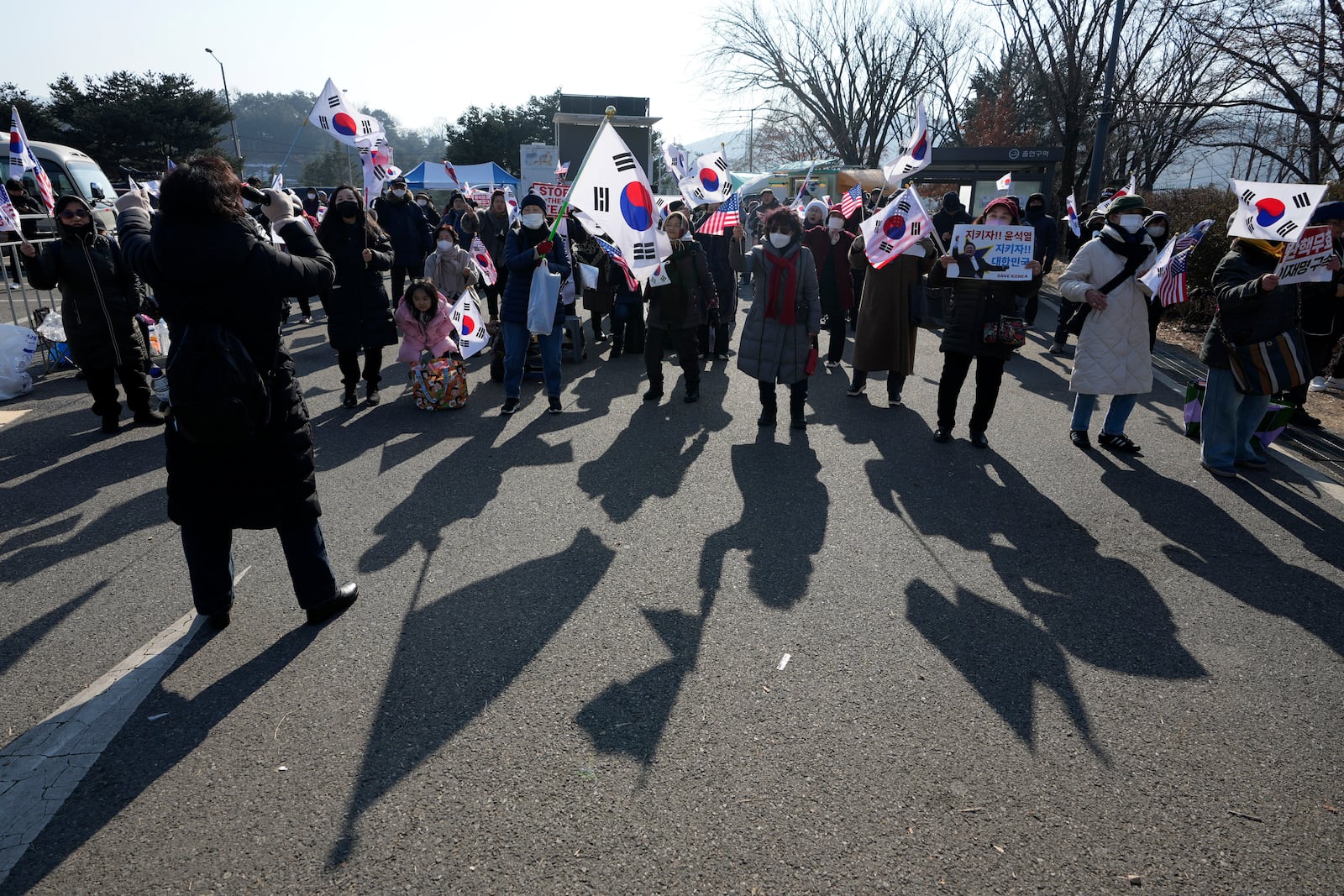 Supporters of impeached South Korean President Yoon Suk Yeol attend a rally to oppose his impeachment outside the detention center where Yoon is sent in Uiwang, South Korea, Friday, Jan. 17, 2025. (AP Photo/Lee Jin-man)