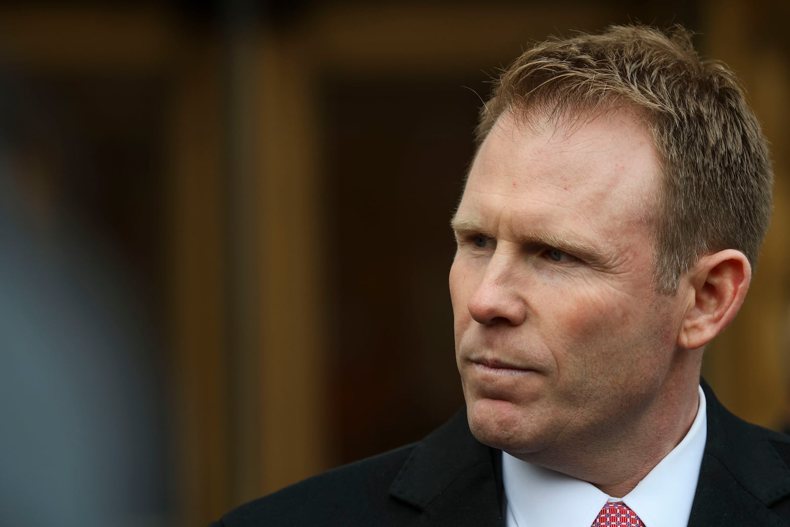 Andrew Giuliani looks on while attorney Joseph Cammarata speaks to the press outside of federal court, Thursday, Jan. 16, 2025, in New York. (AP Photo/Heather Khalifa)