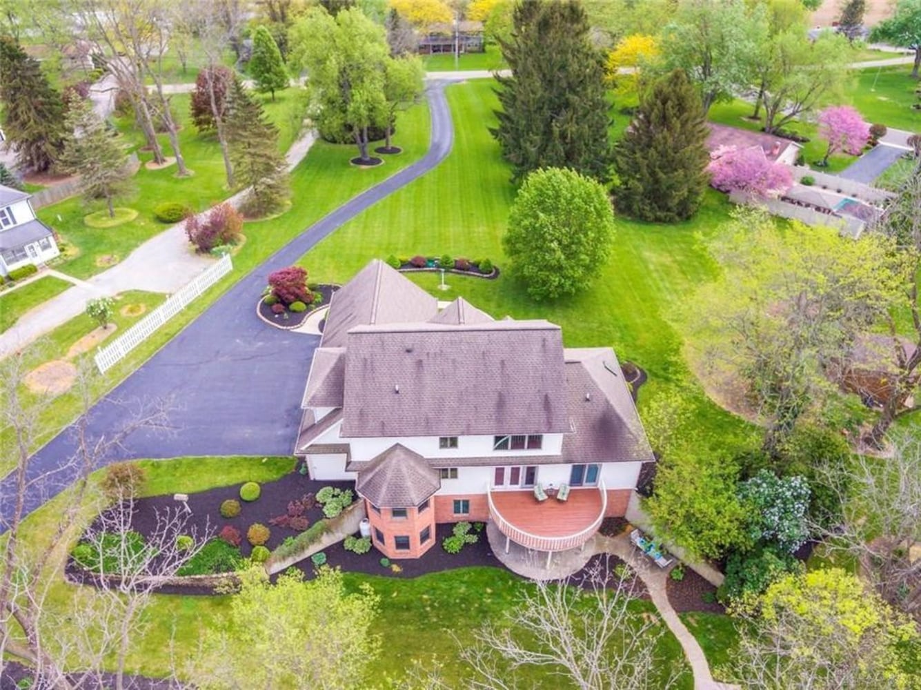 PHOTOS: Nearly 10-acre Miami County property listed has luxury home, stocked fishing pond