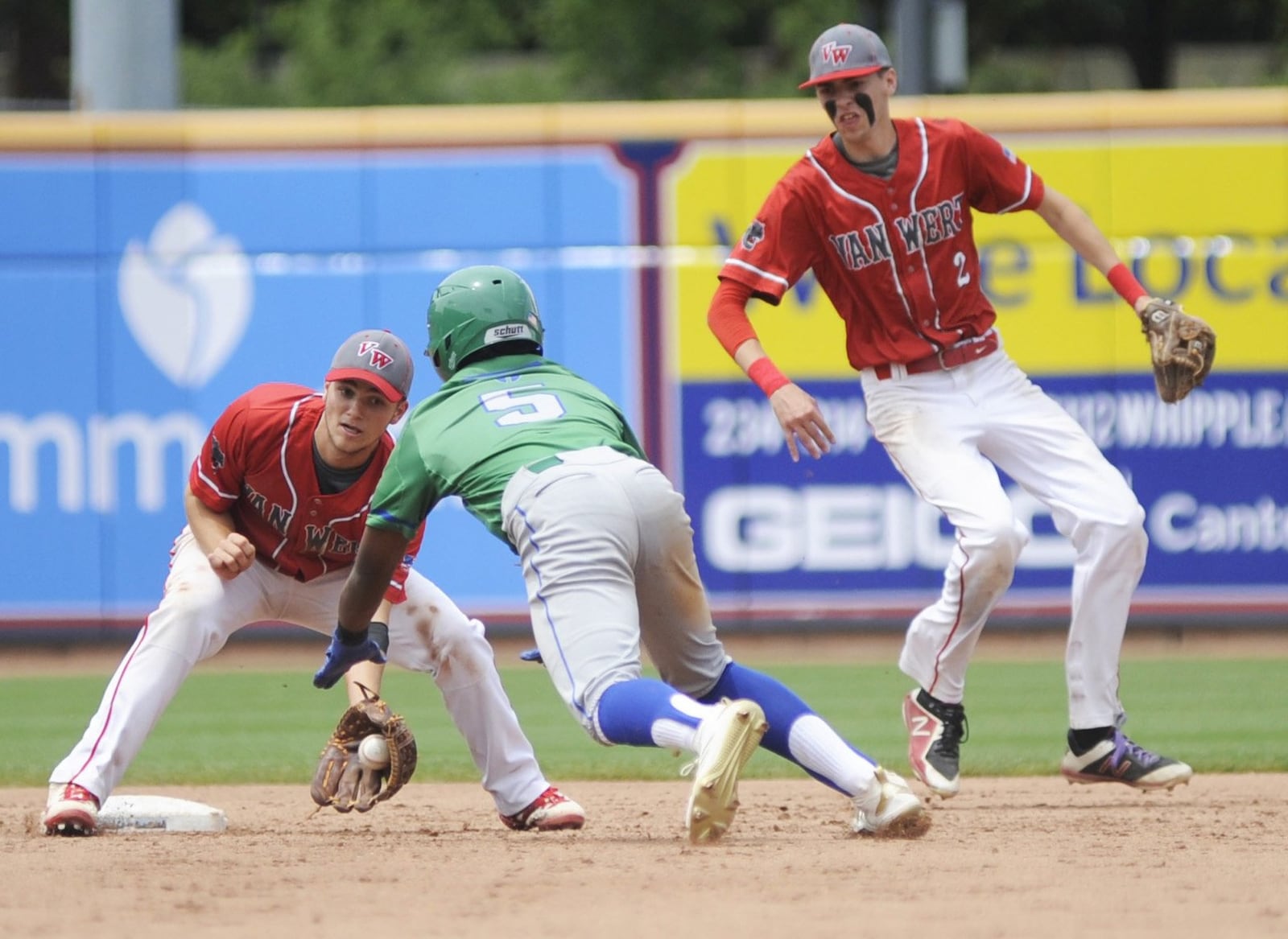 A.J. Solomon of CJ (5) was out trying to steal second base. Chaminade Julienne defeated Van Wert 6-1 in a high school baseball D-II state semifinal at Canal Park in Akron on Saturday, June 8, 2019. MARC PENDLETON / STAFF