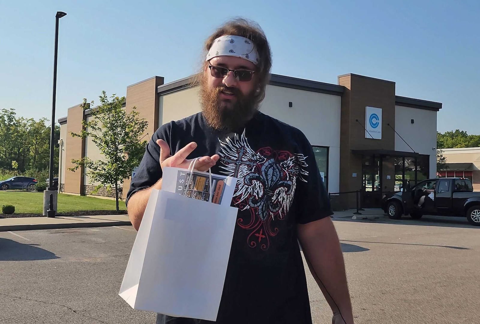 Joseph Ashby purchased recreational marijuana at Columbia Care in Monroe on the first day sales were available on Tuesday, Aug. 6, 2024. NICK GRAHAM / STAFF