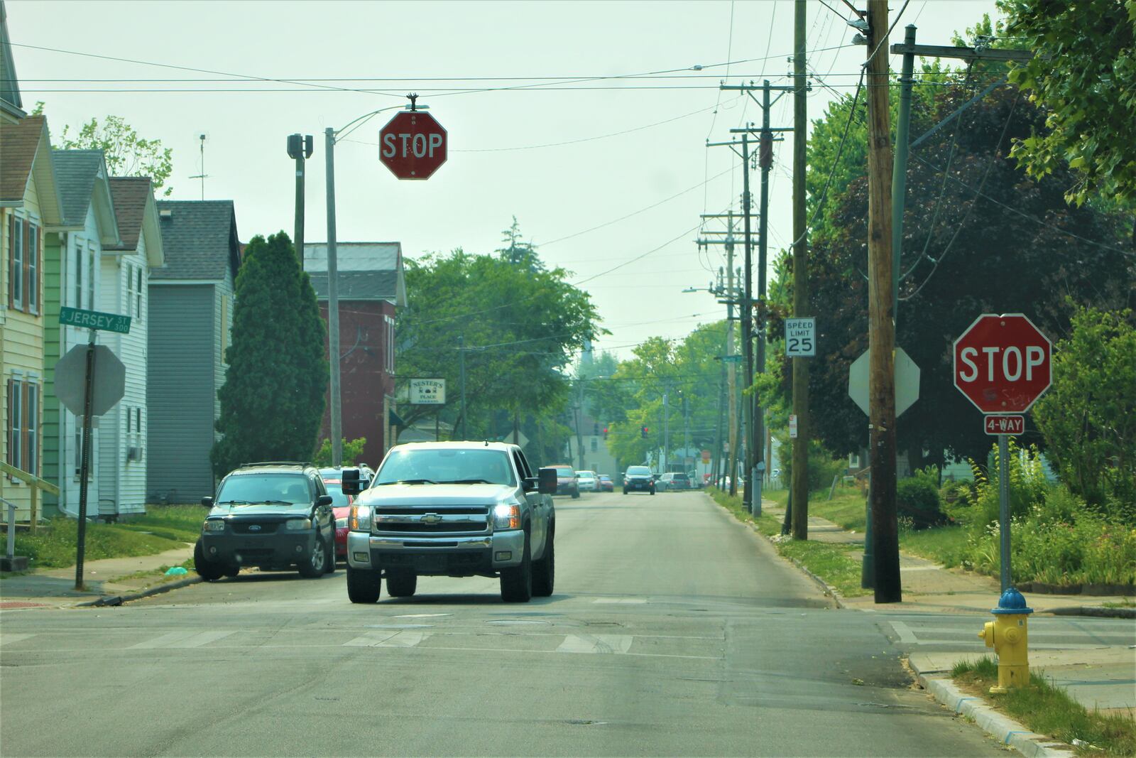 A truck stops at a stop sign at Jersey Street and Burkhardt Avenue in East Dayton. CORNELIUS FROLIK / STAFF