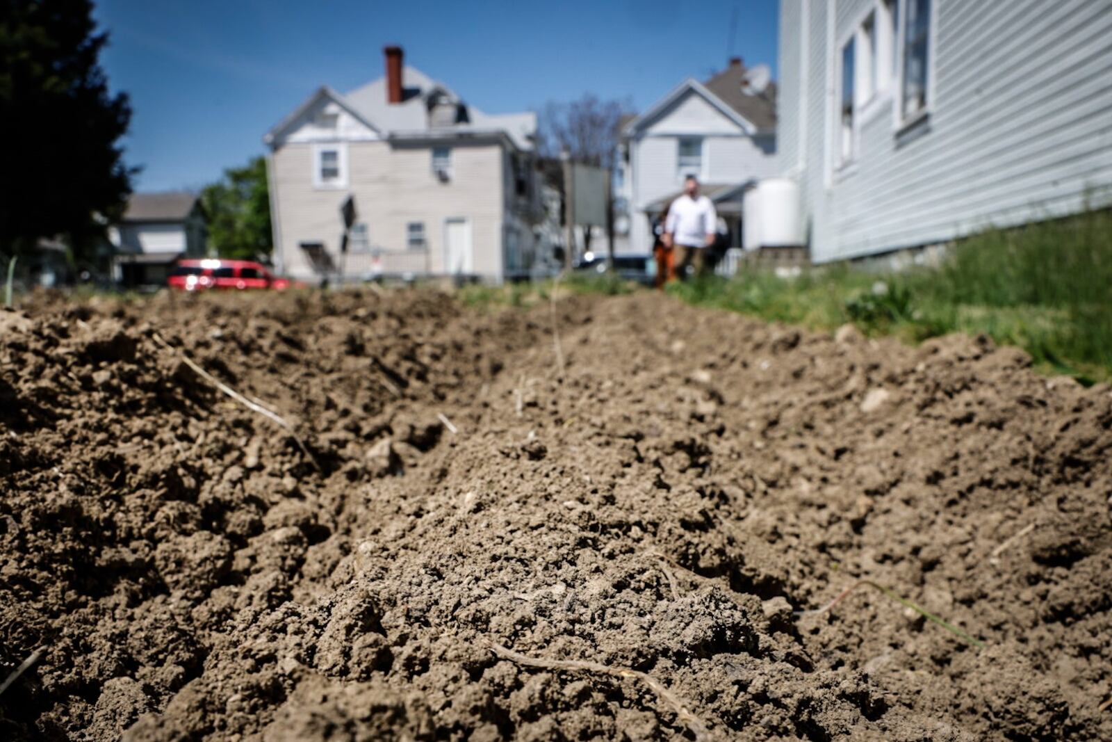 Riverdale neighbors grow a verity of African vegetables in the Unity Community Garden. JIM NOELKER/STAFF