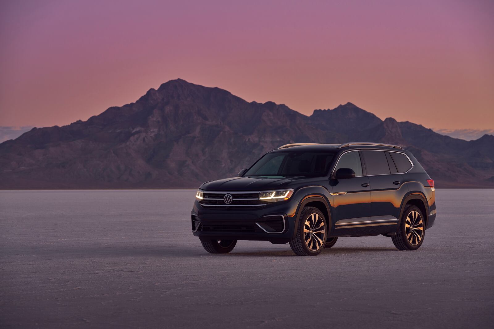 This photo provided by Volkswagen shows the 2021 Atlas, which is quiet and comfortable on the road. It also has the lowest starting price among three-row midsize SUVs. (Courtesy of Volkswagen of America via AP)