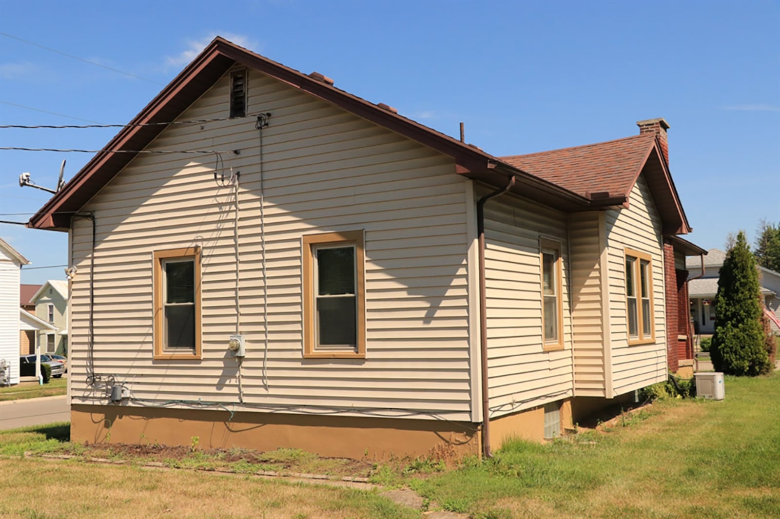 The vinyl-sided exterior is complemented by dimensional roof shingles. CONTRIBUTED PHOTO BY KATHY TYLER