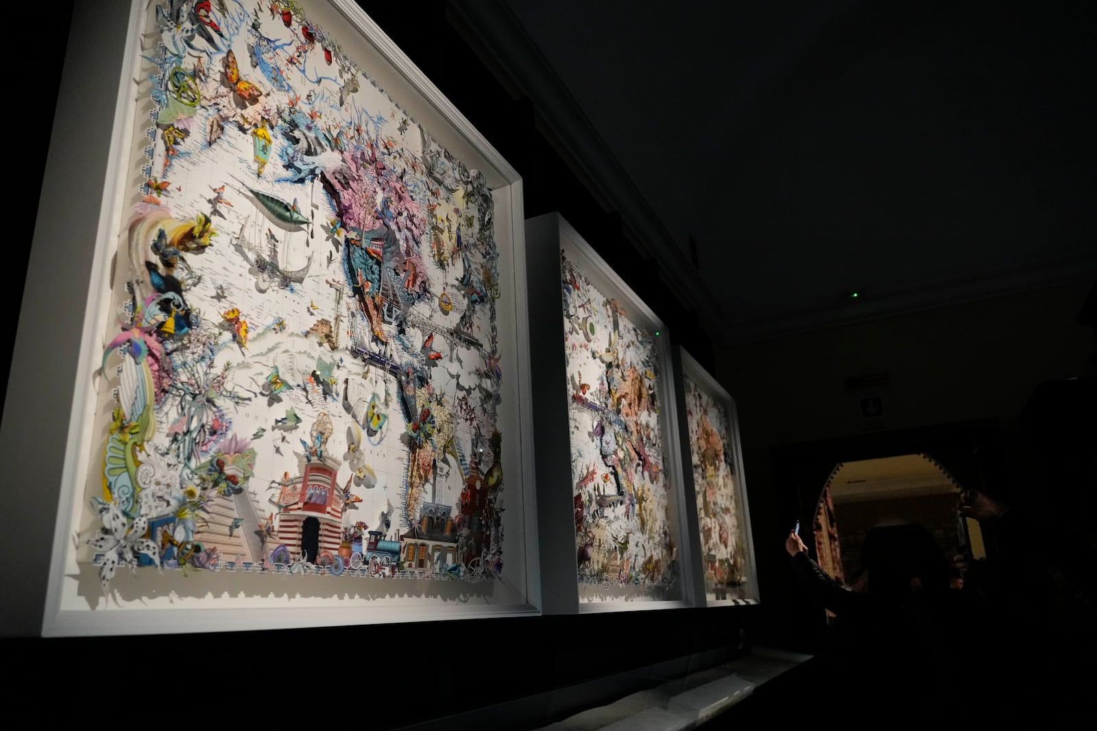 Art installations are displayed during the preview of the exhibition "En Route" organized by the Vatican Apostolic Library exploring world tours of the late 19th century at the Vatican, Friday, Jan. 31, 2025. (AP Photo/Gregorio Borgia)