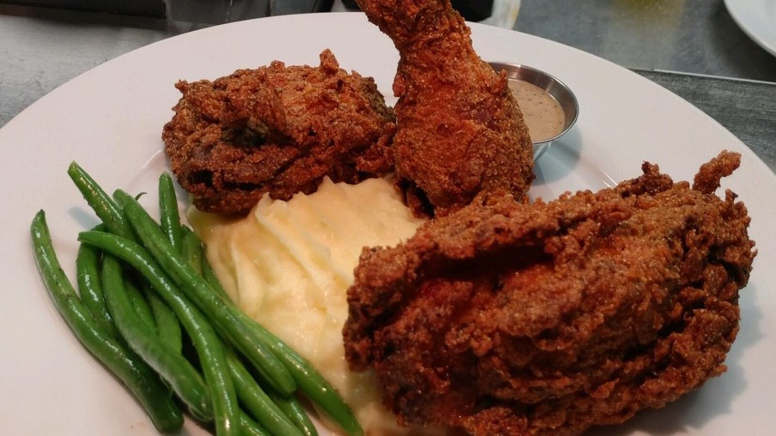 Corner Kitchen's fried chicken, mashed potatoes and veggies. CONTRIBUTED