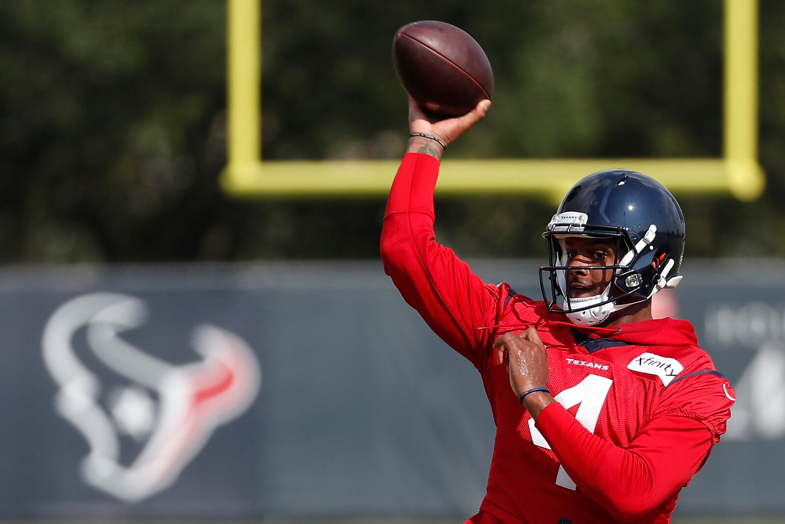 FILE - Houston Texans quarterback Deshaun Watson throws a pass during an NFL training camp football practice Friday, Aug. 21, 2020, in Houston. It has been a mere eight months since Patrick Mahomes led Kansas City from a 24-0 hole to beat Deshaun Watson and the Houston Texans in the divisional round of the playoffs, a brutally efficient comeback that ultimately propelled the Chiefs to their first Super Bowl title in 50 years. A whole lot has changed, though.(Brett Coomer, Houston Chronicle via AP, Pool, File)