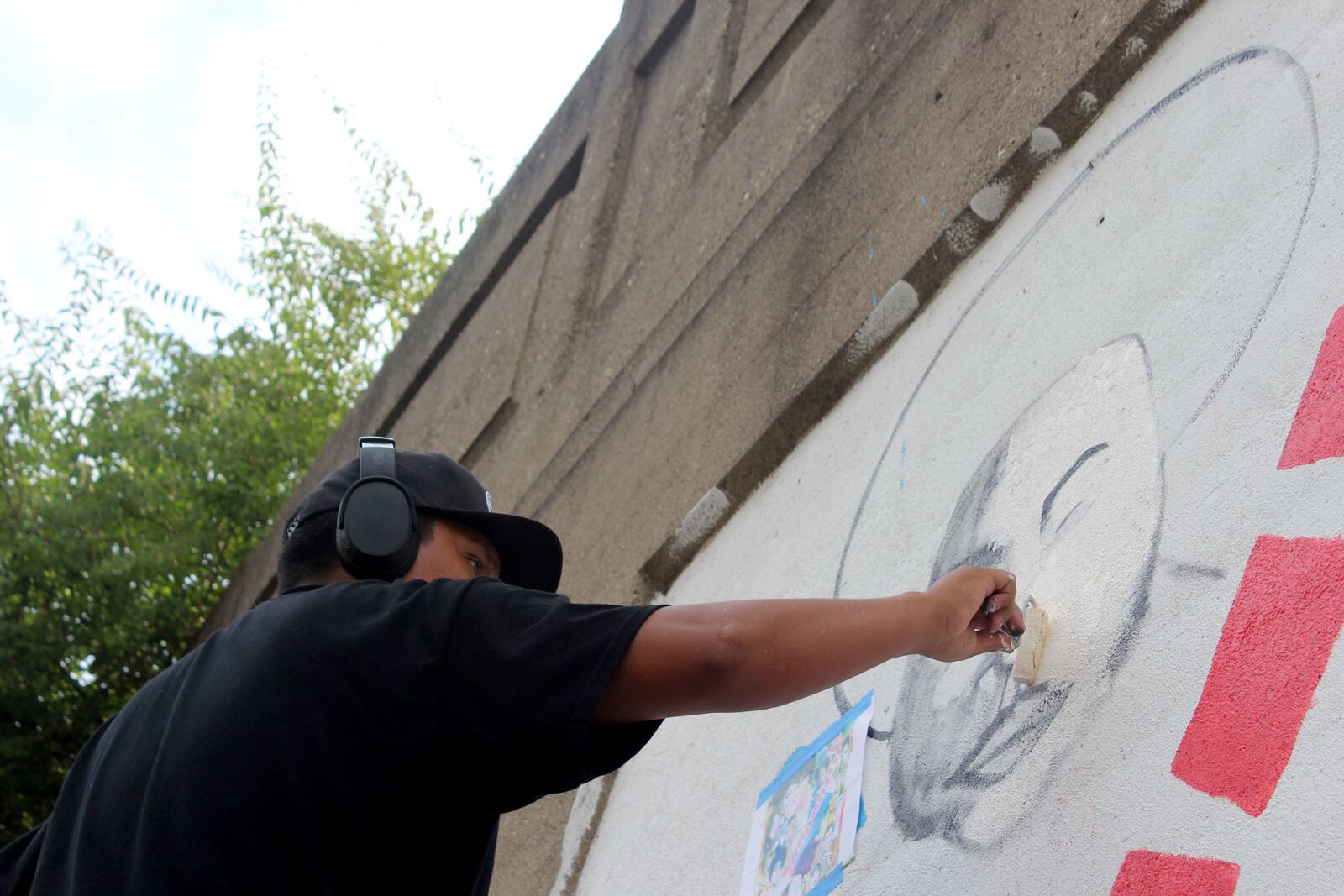 Dayton artist Morris Howard and Brittini Long of Montgomery County Juvenile Court are leading an effort to create a funk wall on Stone Street.