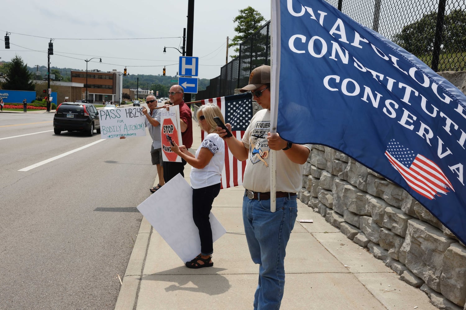 PHOTOS: COVID vaccine protest at area hospitals