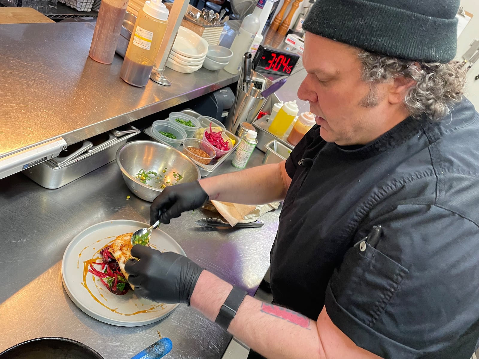 Corner Kitchen is located at 613 E. Fifth St. in Dayton’s Oregon District. Pictured is executive chef Gavin St. Denis. NATALIE JONES/STAFF