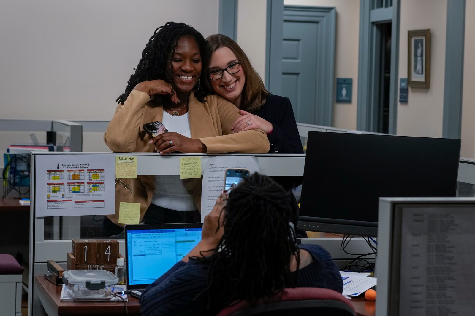 U.S.-Rep.-elect Sarah McBride, D-Del., right, poses for a photo with Delaware State Democrat Senator Marie Pinkney from District 13 on McBride's last day as a Delaware state senator at Delaware Legislative Hall in Dover, Del., Monday, Dec. 16, 2024. (AP Photo/Carolyn Kaster)