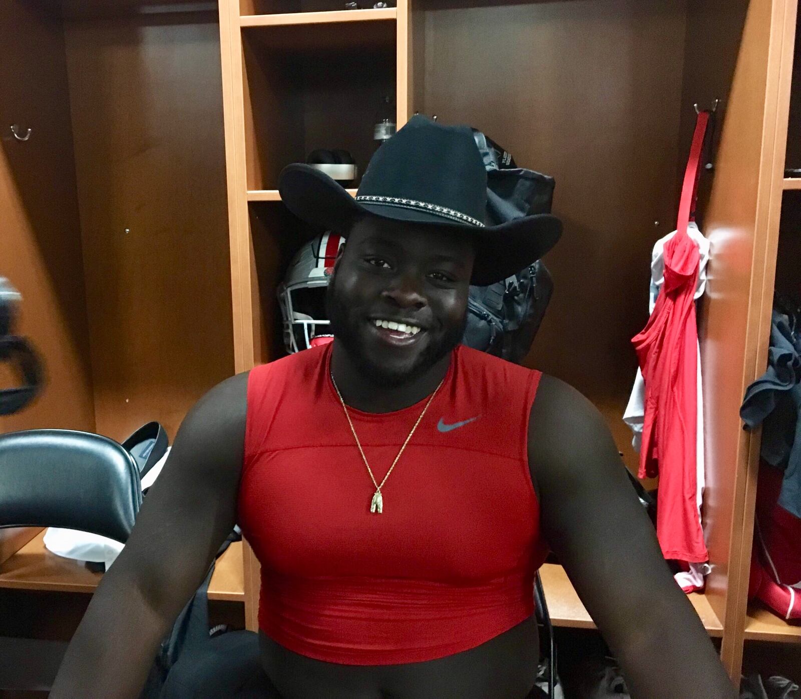 Robert Landers shows off his new cowboy hat in the locker room after Ohio State's 28-23 win over Washington in the Rose Bowl.