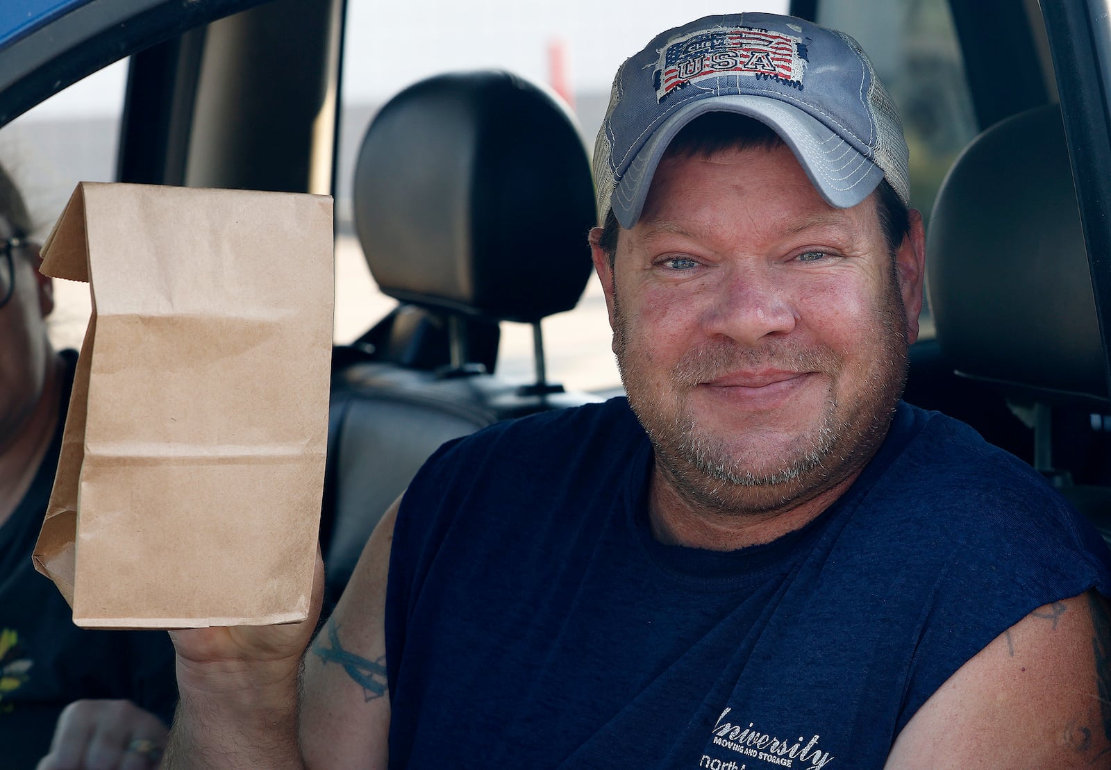 Joshua Stevenson proudly holds up his legally bought marijuana Tuesday, Aug. 6, 2024 that he purchased at Zen Leaf located at 5604 Airway Rd. MARSHALL GORBY\STAFF