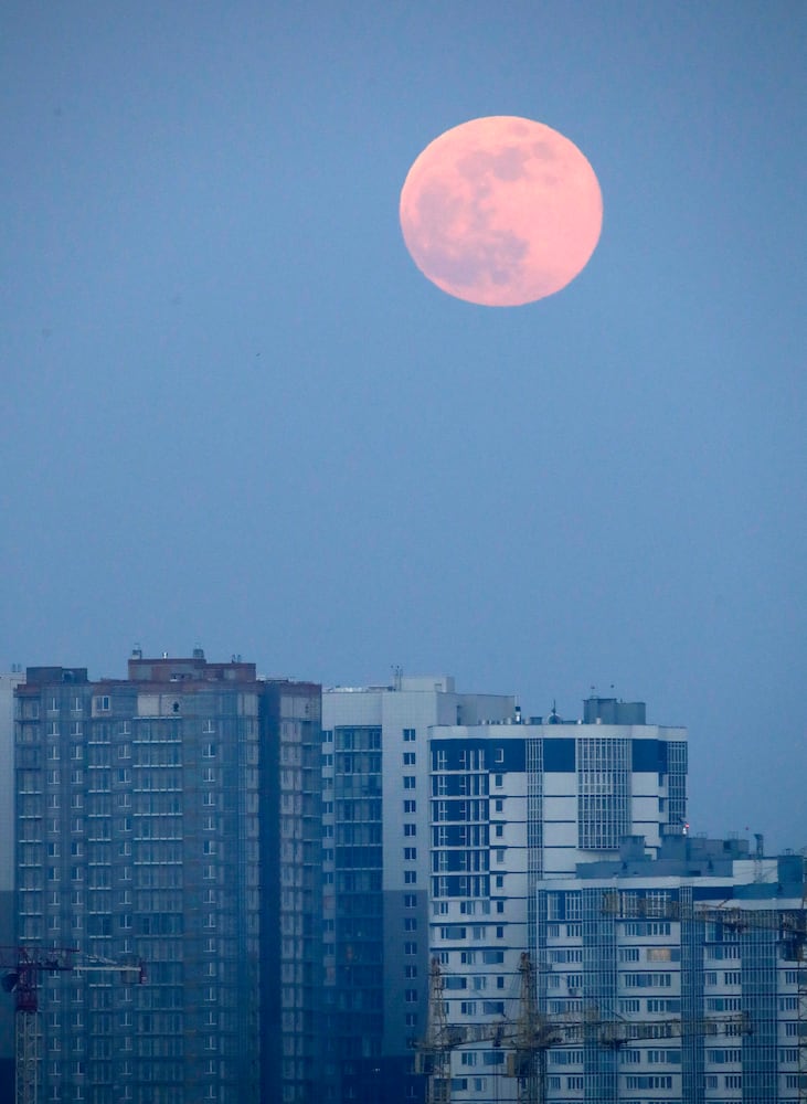 Photos: 'Super snow moon,' largest supermoon of 2019, lights up the sky