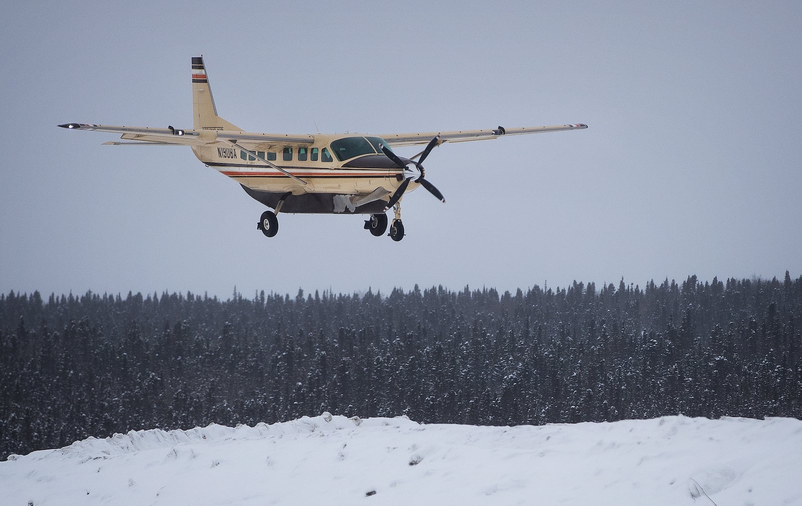 FILE - A Bering Air plane prepares to arrive in Ambler, Alaska, on April 9, 2022. (Emily Mesner/Anchorage Daily News via AP, File)